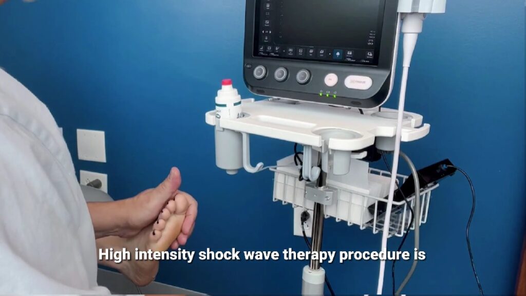 Shockwave therapy device, a foot getting a heel pain treatment from doctor Staschiak. 